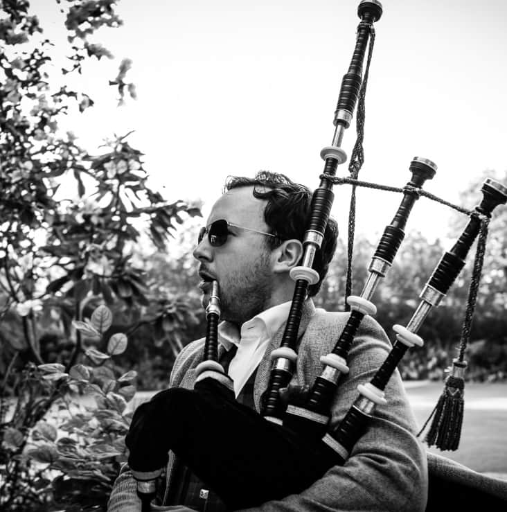 Close up shot of playing bagpipes